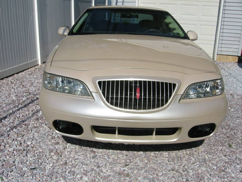 Illustration for article titled For $25,000, Would You Like To Wake Up Next To This 1998 Lincoln Mark VIII “Sleeper?“